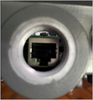 Image of the reset button above the LAN 2 Ethernet port