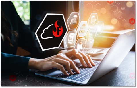 person working on a laptop with a WatchGuard FireCloud logo in between them and the screen