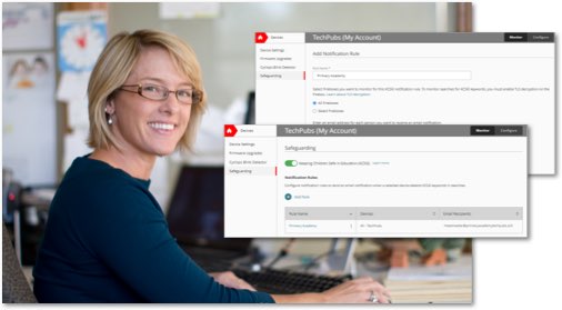 Blond woman working at a desk with WatchGuard Cloud screens in front