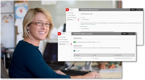 Blond woman working at a desk with WatchGuard Cloud screens in front