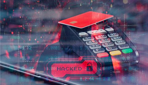 handheld credit card machine with a red credit card on the reader
