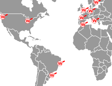 Mappa del mondo con lenti d'ingrandimento rosse WatchGuard che indicano dove lavoriamo
