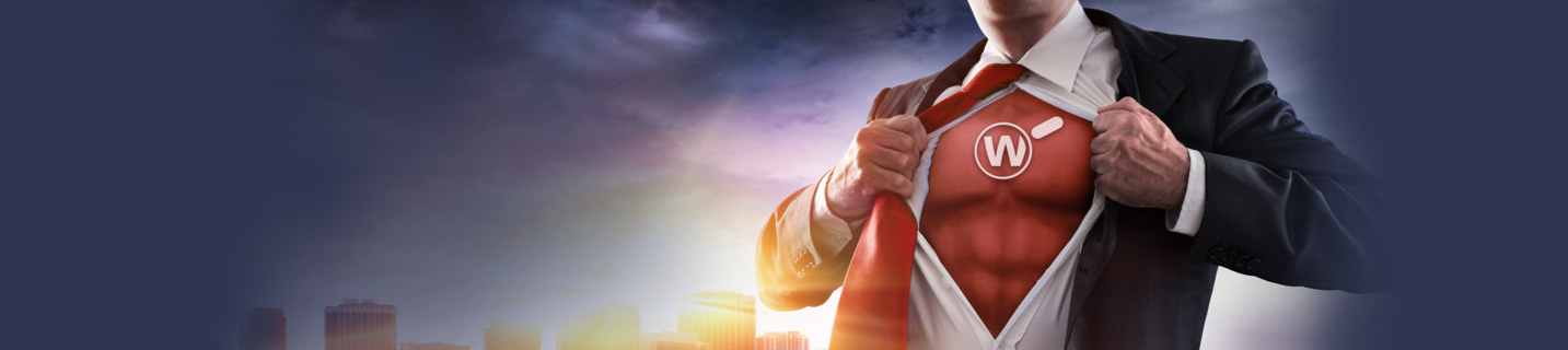Man in a business suit pulling his shirt open to review a red chest with a white WatchGuard icon on it