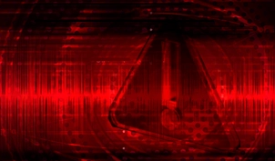 red caution symbol standing on a red circuit board