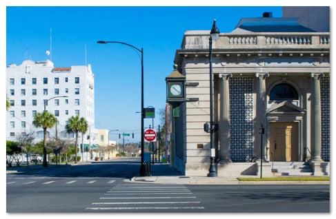 Large government looking buildings along a city street