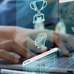 Students using a laptop with digital AI and cybersecurity icons floating above the screen, symbolizing artificial intelligence in K-12 education technology.
