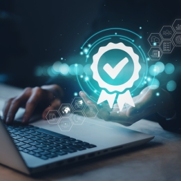 Cybersecurity compliance concept showing digital certification shield and secure network on laptop, representing CMMC requirements for defense contractors