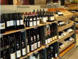 Red wine arranged on store shelves