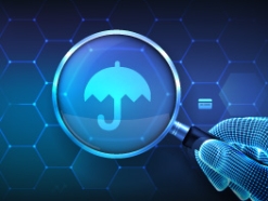 magnifying glass over a glowing blue umbrella icon