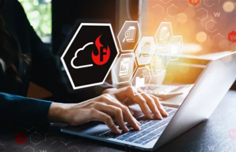 WatchGuard FireCloud logo in between a user and their laptop