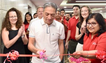 Prakash Panjwani cuts ribbon at new India office