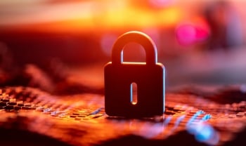 Close-Up of a Secure Lock over Blurred Digital Background in Warm Colors