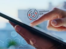 WatchGuard MDR logo next to a tablet computer in use