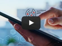 WatchGuard MDR logo next to a tablet computer in use